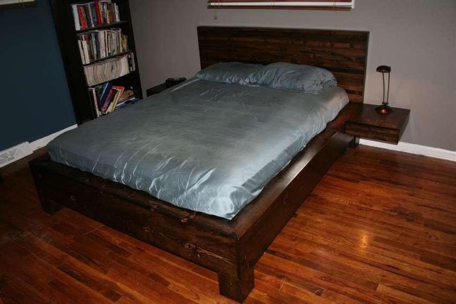 Двуспальная кровать с встроенными тумбочками